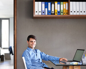 Canvas Print - Office, laptop and portrait of business man at desk for working online, planning and website research. Corporate worker, professional and happy person on computer for internet, project and email