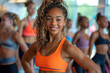 Beautiful young athletic girls smiling and doing fitness, gymnastics in a modern hall