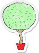 retro distressed sticker of a cartoon tree