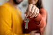 © Prostock-studio - Closeup Shot Of Romantic Young Couple Holding Home Keys In Hands