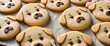 Cookies shaped like cute dog faces. Animal face cookies. Decorated with chocolate.