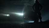 Fototapeta Zachód słońca - Suspicious Man Next to His Vehicle During Night Hours