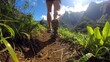 Trail runners on a rugged mountain, a close - up of a person's legs, detail of the shoe hitting the ground uphill in a challenging jungle trail, surrounded by beautiful mountains and scenery.  