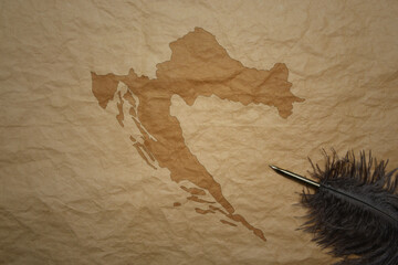 Wall Mural - map of croatia on a old paper background with old pen