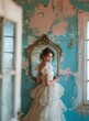 Bride in a white dress standing next to to a mirror in a old ruined room. Elegance and ruggedness contrasting background.