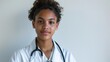 Black Nursing Graduate in White Coat and Stethoscope