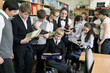 © Pavel Losevsky - Eleven students (mr) in school library.