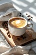 © Twomeows_AS - One coffee cup on rustic wooden counter top with bright sunlight background.