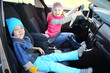 © Pavel Losevsky - boy and girl playing in car salon