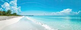 Fototapeta  - panoramic sandy beach and clear blue skies, banner format, copy space
