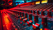 © Prasanth - Wide-angle shot of a mixing console for a recording studio. Red cinematic studio light.