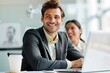 © Adriana - business partners working together in office