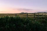 Fototapeta Dmuchawce - Sunset over the fields in north Wales