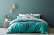Vibrant turquoise bedding contrasting against a minimalistic white frame on a bedroom wall, bathed in soft natural light.