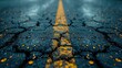 Raindrops glisten on a dark asphalt road with a yellow dividing line