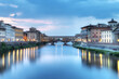 View of the Arno River from the Ponte Vecchio Bridge, Florence Italy
