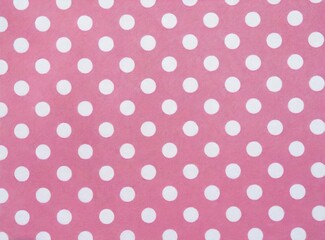 Canvas Print - Seamless white polka dot pattern on pink background