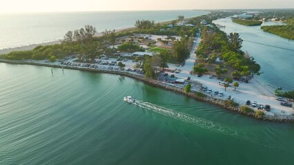 Wall Mural - Parking lot for tourists cars in front of ocean beach with soft white sand in Florida. Popular vacation spot