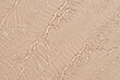 © ADDICTIVE STOCK - Beige liquid makeup swatches with glossy texture