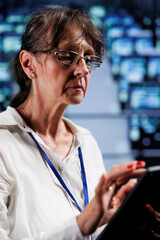 Poster - seasoned wireman preparing cloud computing business recovery plan, monitoring data center energy con