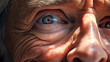 Close-up of the wrinkled face of an old man, large pupils.