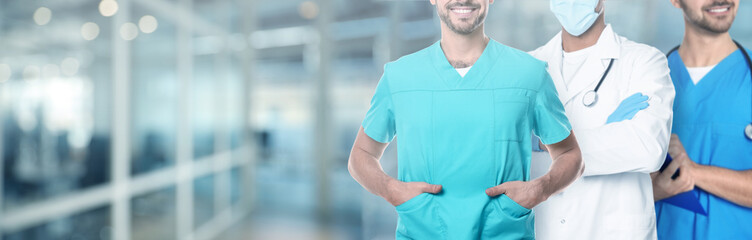 Poster - Doctors and nurse in hospital, closeup. Banner design with space for text