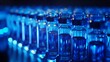 Vibrant vials in blue tones showcasing modern medical research and development