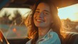 Happy young woman sitting on driver's seat in car