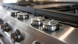 The control on the front of the stove allowing you to adjust the flame intensity for precise cooking.