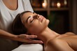 
Therapist providing head massage to alleviate tension and promote circulation