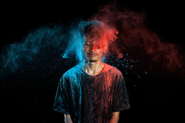 Poster - Portrait of a man celebrating Holi with colorful Holi powder