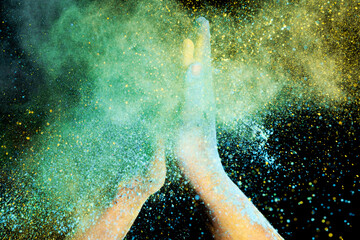 Poster - Human hand with colorful Holi powder