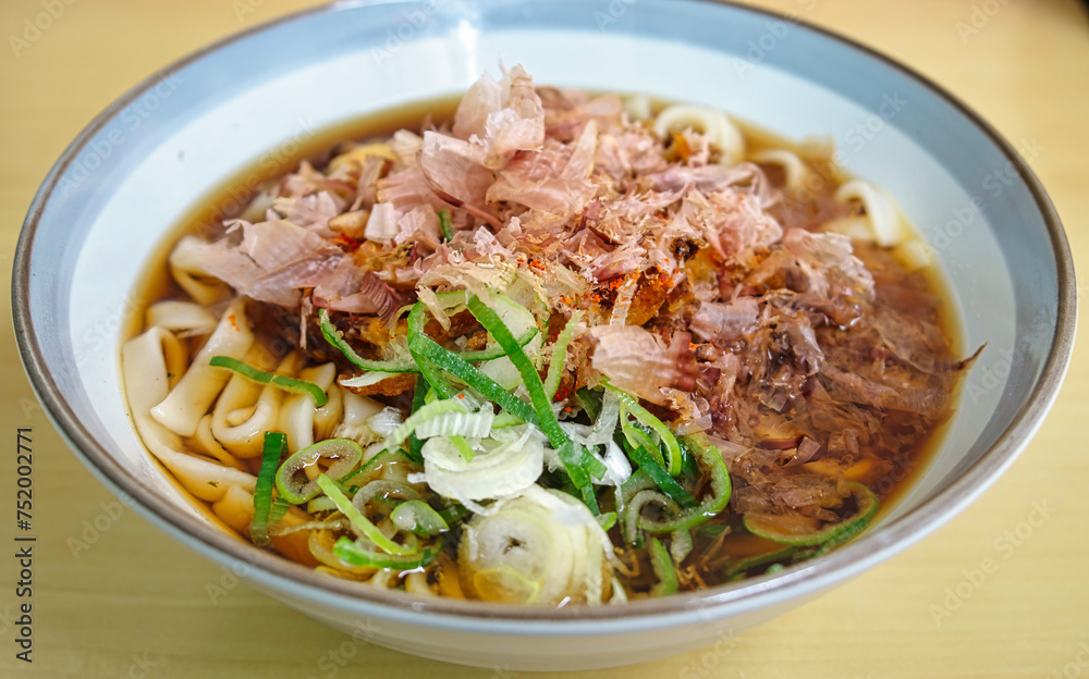 Aichi,Japan - March 5, 2024: Flat udon or thick Japanese noodles with dried bonito called “Kishimen”. The soul food of Aichi Prefecture in Japan