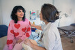 © Johnér - Female gynecologist discussing with teenage girl about sex education in clinic