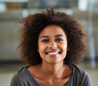 © Mapodile/peopleimages.com - Portrait, smile and afro with black woman in home to relax on weekend for morning free time. Face, girl and natural with happy young person in casual clothing at apartment for break or resting