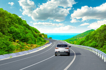 car driving on the road of europe. road landscape in summer. it's nice to drive on the beach side highway. Highway view on the coast on the way to summer vacation. France trip on beautiful travel road