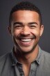 closeup of smiling mixed race man with for studio background