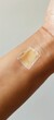 Skin cancer detection patch on an arm with a focus on early warning signs and changes in mole appearance