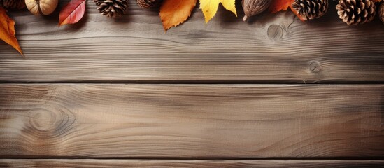 Poster - Autumn Foliage and Pinecones Adorning a Rustic Wooden Background with Space for Text