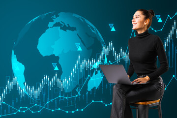 Poster - Attractive happy young european woman sitting on chair with laptop and creative globe hologram with growing forex chart on blue background. Global business, international stock market concept.