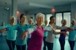 © Road Red Runner - Group of senior women dancing in a dance studio during an exercise session with their physiotherapist.