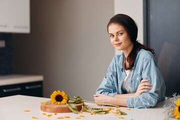 Wall Mural - Healthy Lifestyle: Young Caucasian Women Enjoying a Fresh Breakfast Salad in a Modern Kitchen