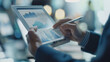 © VK Studio - Business analytics review on digital tablet screen in office setting.