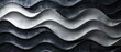 Detailed close-up view of a wavy metal surface, showing intricate patterns and textures.