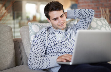 Aufkleber - Relax, research or businessman on laptop for remote work, article post or networking on couch. Download, smile or happy person on sofa typing online on technology for update, email or news in home