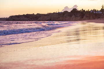 Wall Mural - Sunset on the beach in Armacao de Pera, Algarve, Portugal