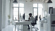 © Jaroon - A tech startup team is formulating their strategy while occupying an office.