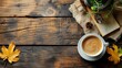 © haizah - Table top view aerial image stationary on office desk background concept.Flat lay objects the cup of coffee with essential accessory.Items on modern brown wooden at home studio.