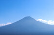 Mount Fuji without snow in summer against clear blue sky background