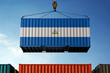 Nicaragua trade cargo container hanging against clouds background